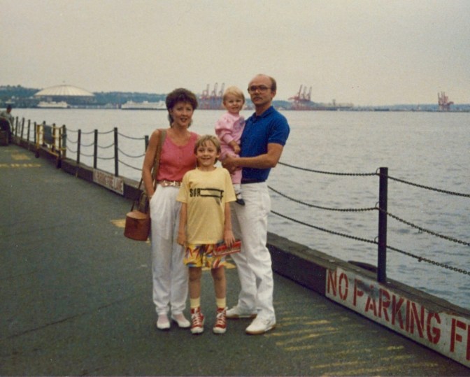 My family in Seattle, circa 1987. My t-shirt was a lie: I've never been surfing.